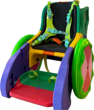 A colorful 3D-printed custom child's wheelchair built for MakeGood